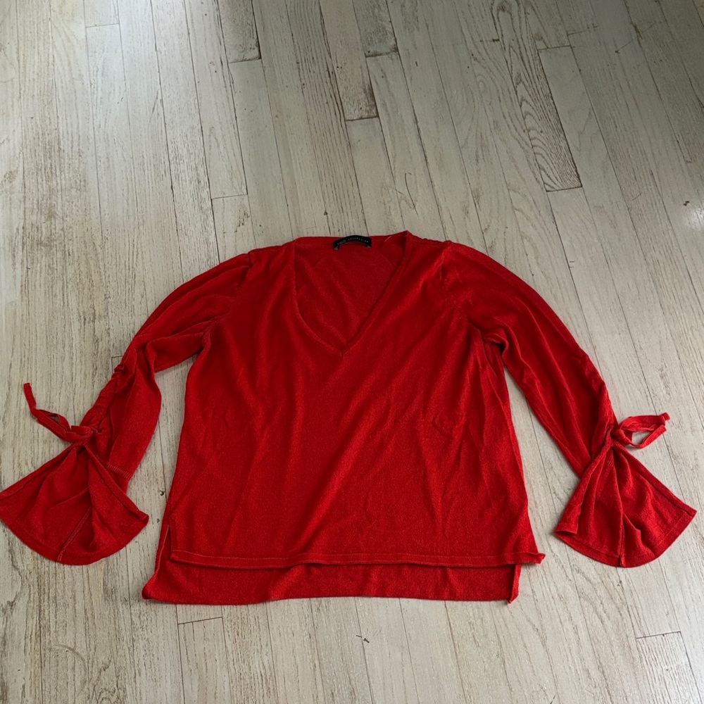 Burnt orange women’s V-Neck Top full length sleeve - ties & open flared cuffs.